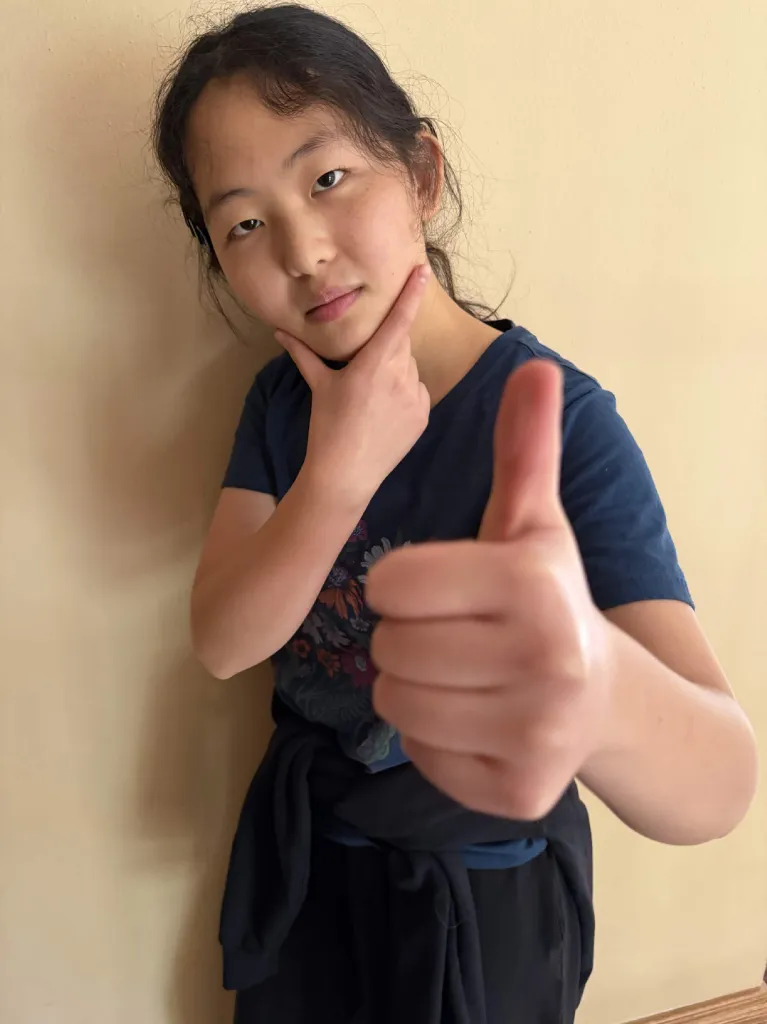 A club member giving a thumbs up
